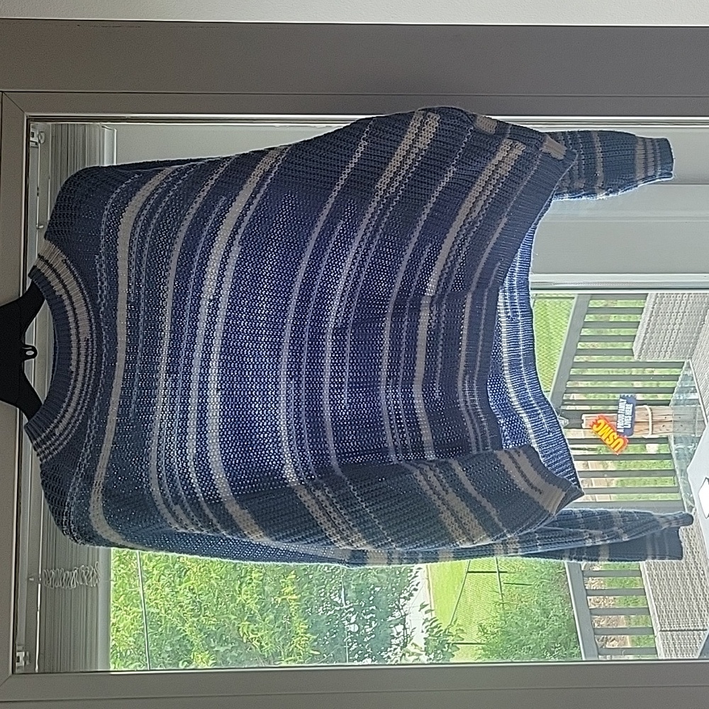 Light blue and white striped knit sweater